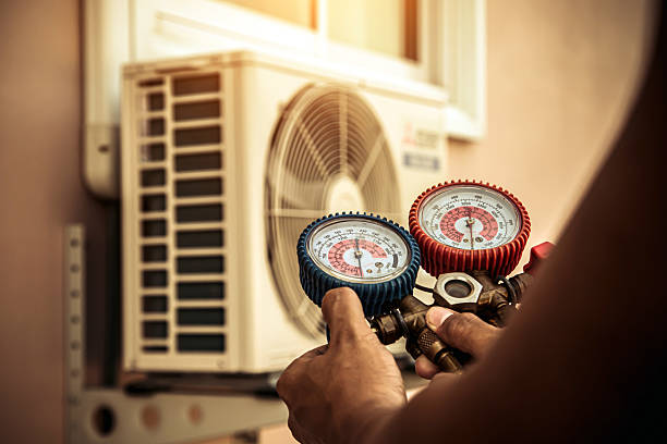 Professional Air Conditioning Service technician working in Shelbyville, IN